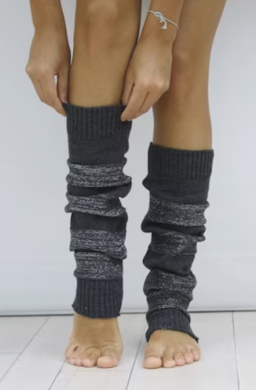 dancer wears the leg warmers